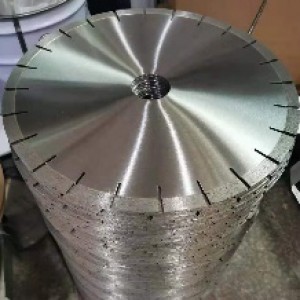 asphalt blade cutting concrete